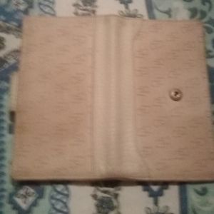 Dooney Bourke Signature Wallet.